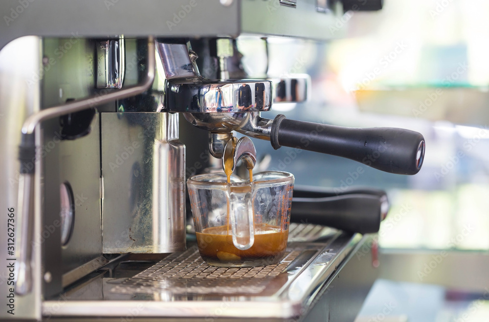 The process of preparing espresso in a professional coffee machine