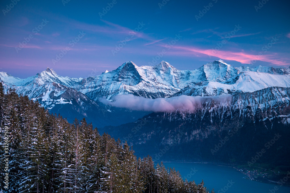 Eiger Mönch and Jungfrau during the blue hour in winter