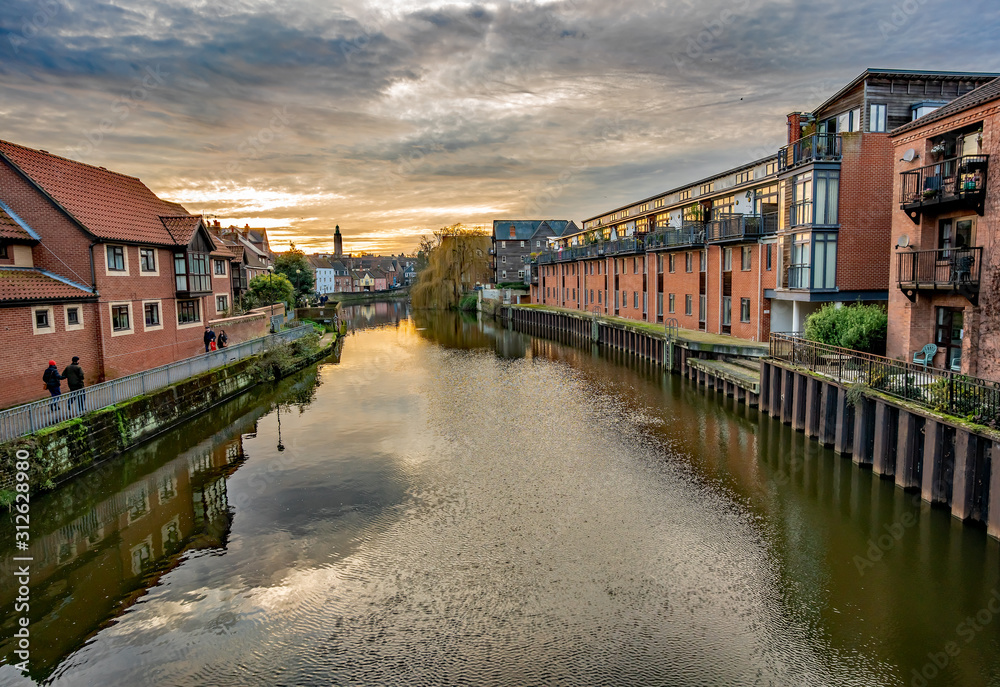  A view down the River Wensum from White Friars Bridge in the city of Norwich at dusk