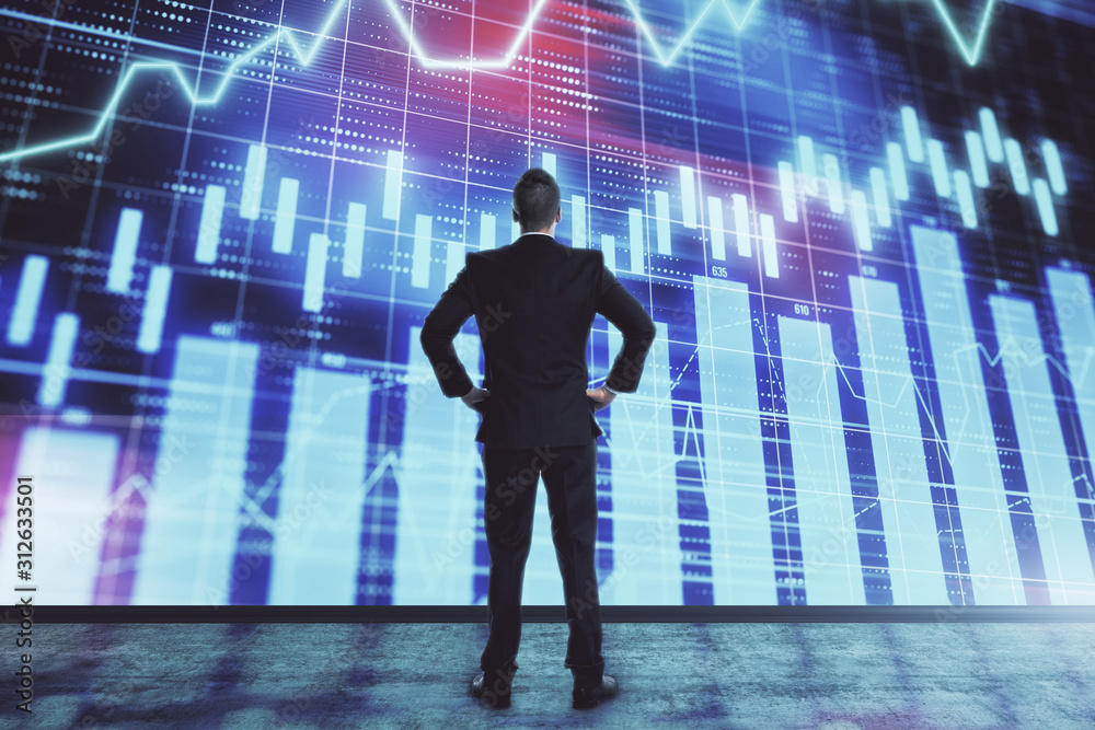 Businessman and forex graph hologram. Double exposure. Concept of financial education and analysis Businessman and forex graph hologram. Double exposure. Concept of financial education and analysis