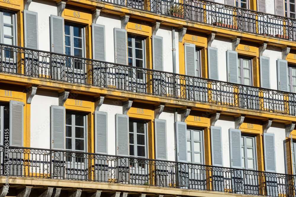 Detail of numbered balconies in the Plaza de la Constitución in San Sebastian, Spain, Europe. Horizontal