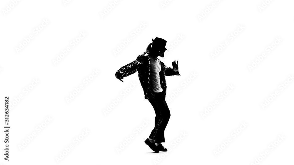 Silhouette of a young man dancer dancing in style Michael Jackson on white background. Close up, slow motion. Silhouette of a young man dancer dancing in style Michael Jackson on white background. Close up, slow motion.