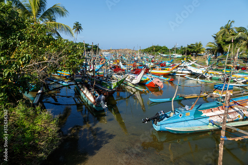 Wallpaper Mural an infinite number of boats in the river channel at fish market in Galle, Sri Lanka. Exotic Asia Torontodigital.ca