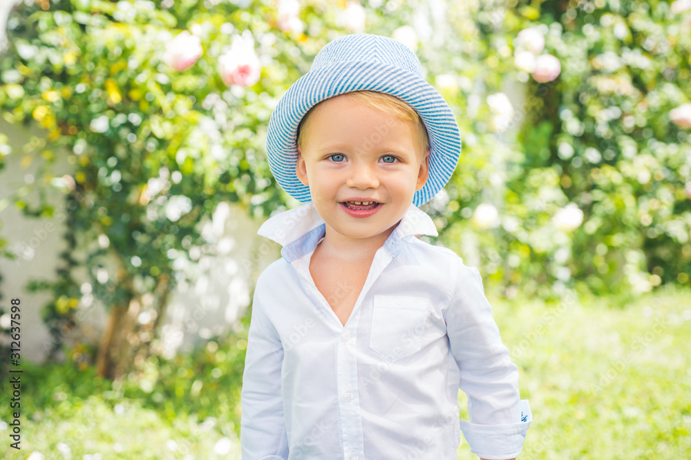 Happy child face. Child has summer joy. Happy day. Boy cute playful cheerful child funny grimace face. Happy child face. Child has summer joy. Happy day. Boy cute playful cheerful child funny grimace face.