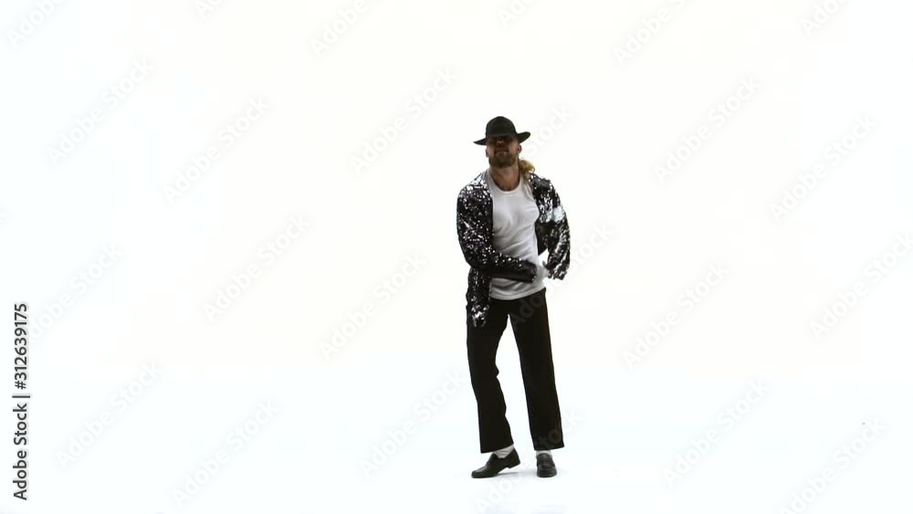 Young stylish teenager is showing dance moves. Isolated over white background. Close up, slow motion. Young stylish teenager is showing dance moves. Isolated over white background. Close up, slow motion.