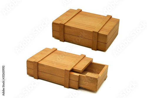 Two handmade opened and close wooden mystery box or puzzle box as gift for people who love solving the puzzle to unlock and open it  isolated on white background
