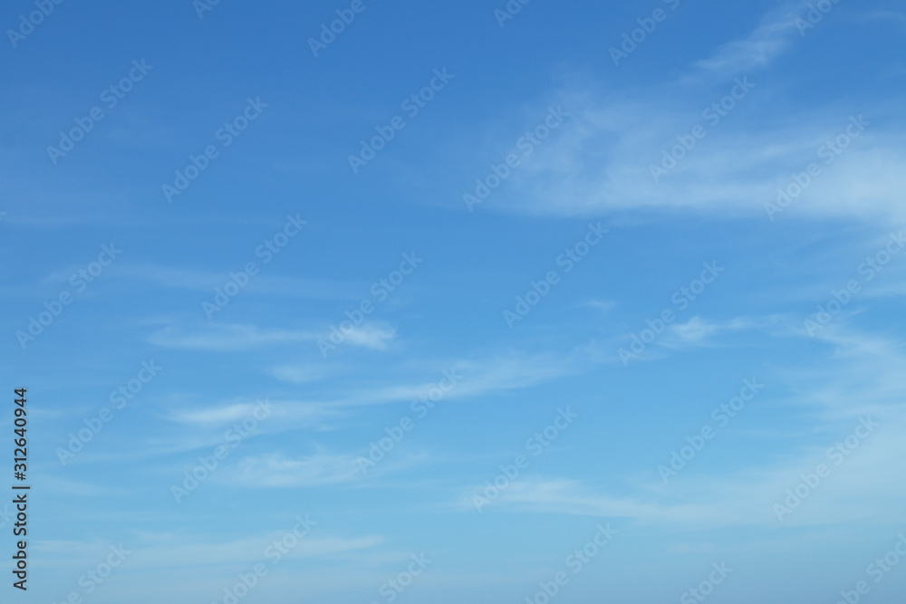 Beautiful tiny white clouds with blue sky in winter seasonal.