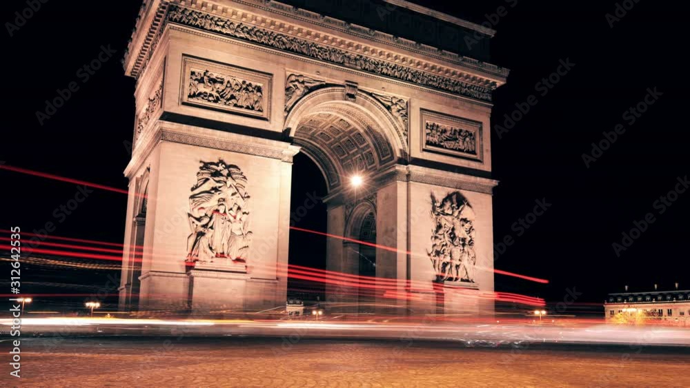 France, Paris, November 28, 2018 - Arch De Triomphe And Champs Elysees Traffic At Night, Time-Lapse. France, Paris, November 28, 2018 - Arch De Triomphe And Champs Elysees Traffic At Night, Time-Lapse.