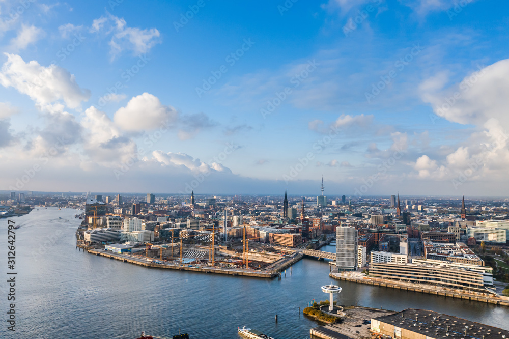 Aerial drone view of Port of Hamburg near Hafencity after storm with blue sky