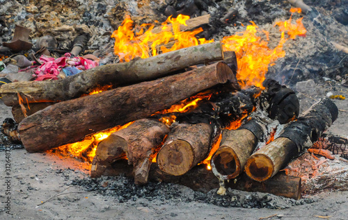 Photography A funeral pyre burning intensely at Swargadwar crematorium,Puri,Odisha state,India