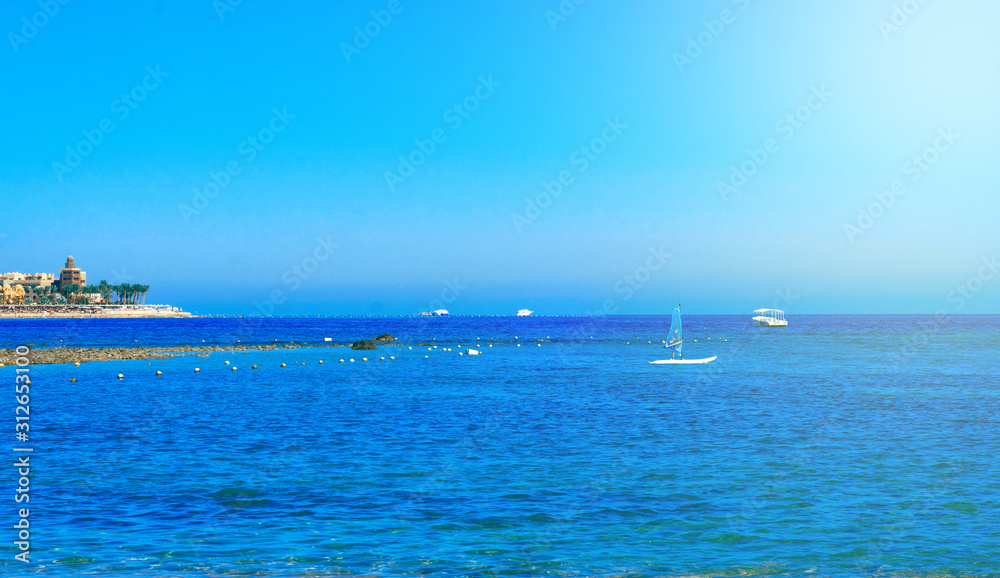 Modern Egyptian city. Seafront Hurghada. View of Egyptian city of Hurghada from Red sea