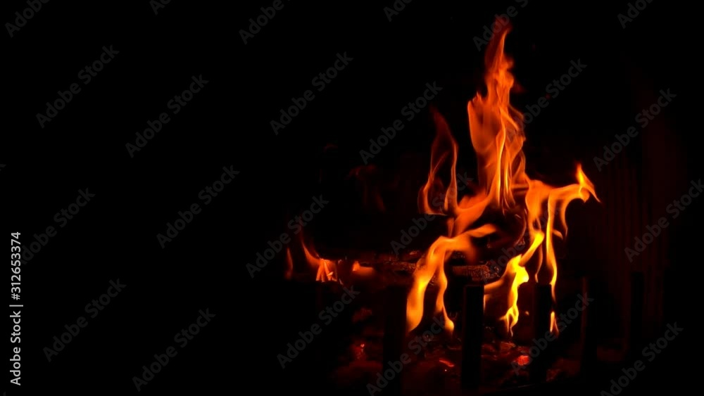 Super slow motion of burning Fire In The Fireplace. A looping clip of a fireplace Super slow motion of burning Fire In The Fireplace. A looping clip of a fireplace