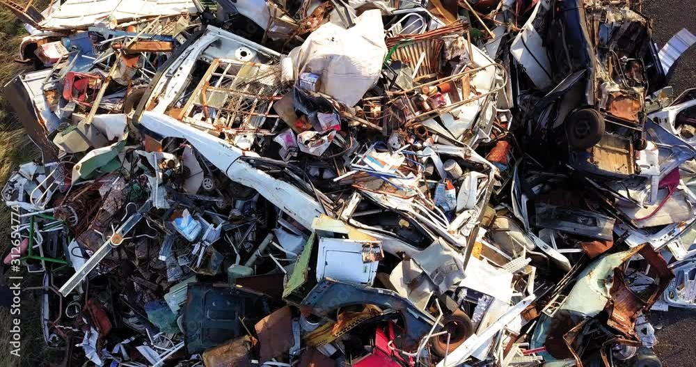 Vehicle scraps threaten the environment for lack of proper destination, neglect of the environment. Aerial camera. Vehicle scraps threaten the environment for lack of proper destination, neglect of the environment. Aerial camera.