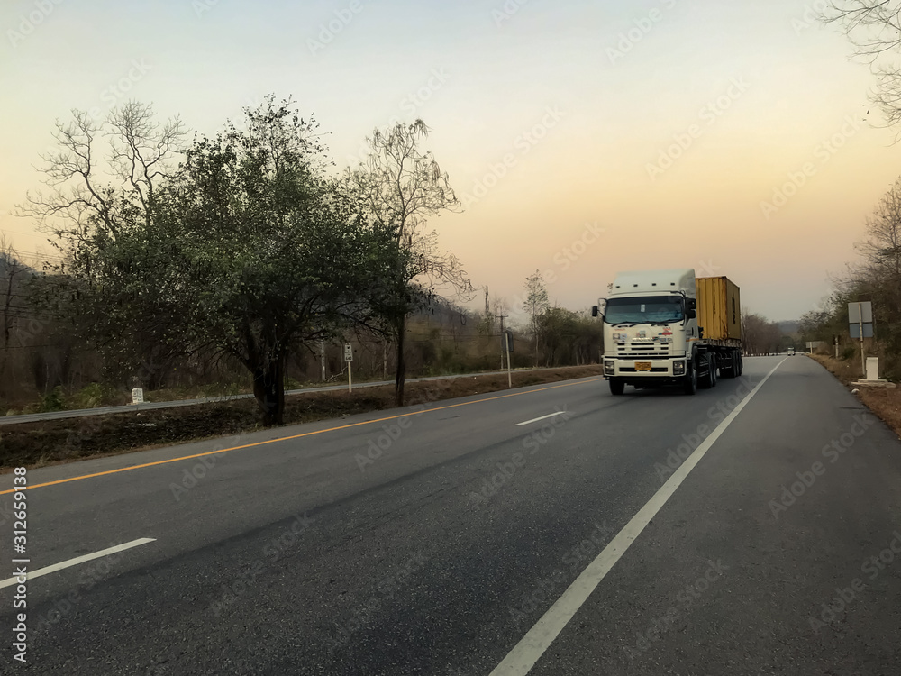 Truck on road container, transportation concept.Speed fast motion blurred Transporting Land transport on the expressway