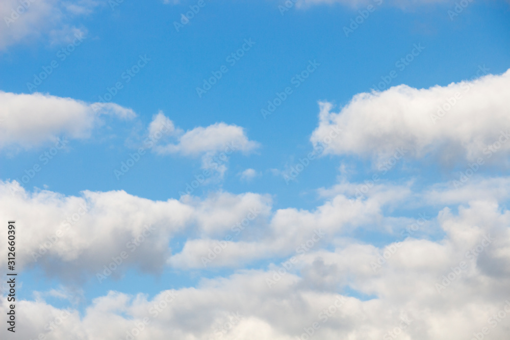 Fototapeta premium Bright blue sky with white clouds for background or wallpapers