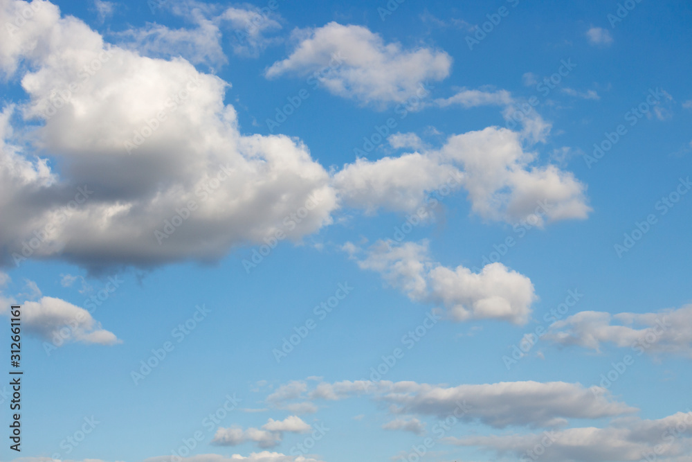 Fototapeta premium Bright blue sky with white clouds for background or wallpapers