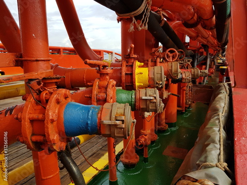 Manifold with pipes and valves on a supply boat photo
