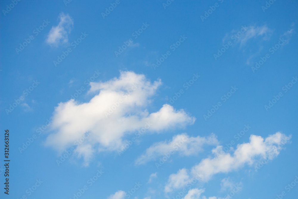 Bright blue sky with white clouds for background or wallpapers Bright blue sky with white clouds for background or wallpapers