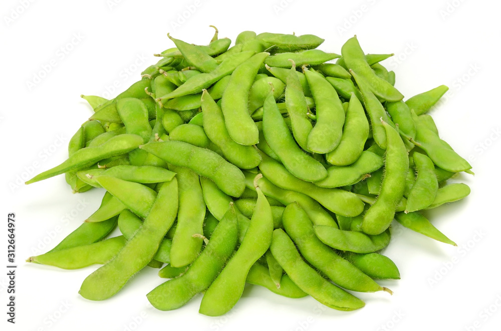 Pile of edamame on white surface. Green soybeans in the pod. Unripe soya beans, Maodou. Glycine max. Legume, edible after cooking. Rich protein source. Closeup, on white background, macro food photo. Pile of edamame on white surface. Green soybeans in the pod. Unripe soya beans, Maodou. Glycine max. Legume, edible after cooking. Rich protein source. Closeup, on white background, macro food photo.