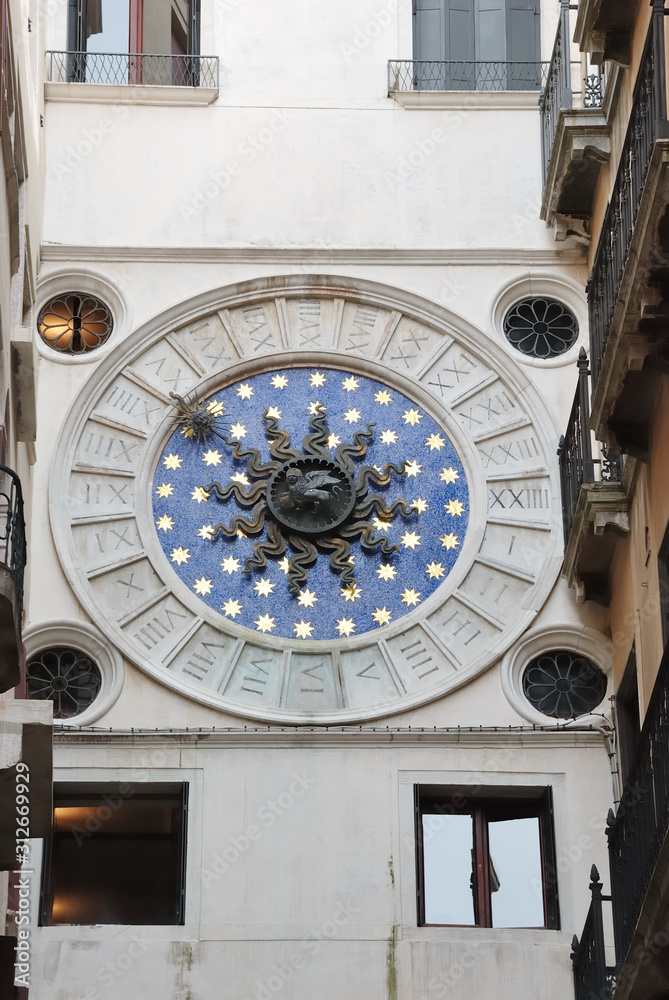 Close up of the clock face on the north side of the clock tower in St. Mark Place Venice Italy