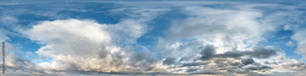 blue sky with beautiful evening cumulus clouds. Seamless hdri panorama 360 degrees angle view with zenith for use in graphics or game development as sky dome or edit drone shot