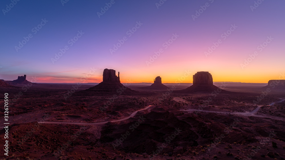 Beautiful sunrise over the red rocks of Monument Valley in Arizona Beautiful sunrise over the red rocks of Monument Valley in Arizona