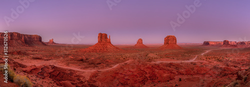 Beautiful sunset over the red rocks of Monument Valley in Arizona photo