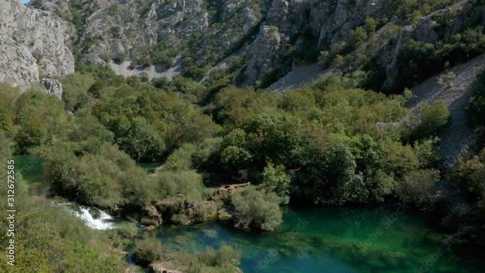 Zrmanja river can, Croatia. Aerial orbit above national park valley gorge greenery & river wildlife.. Zrmanja river can, Croatia. Aerial orbit above national park valley gorge greenery & river wildlife..