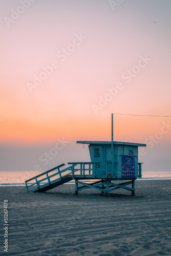 Lifeguard stand on the beach at sunset, in Santa Monica, California