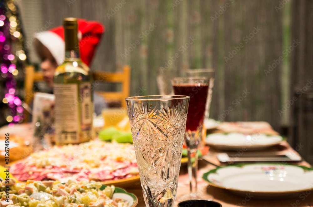 New year's Russian table with salads and wine