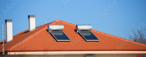 Foto solar heater panels on the roof