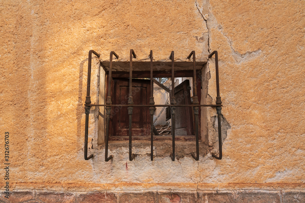 small window with fence of the new farmhouse of Escariantes, today abandoned that place was a luxury home years ago
