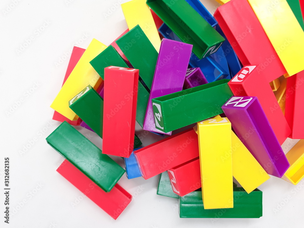 Bright Colorful Parts Pieces Japanese Speed and Agility Stacked Square Block Games in White Isolated Background Bright Colorful Parts Pieces Japanese Speed and Agility Stacked Square Block Games in White Isolated Background