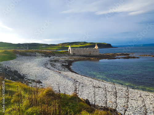 Autumn coast and ruin in background, Northern Ireland, Island Rathlin  photo