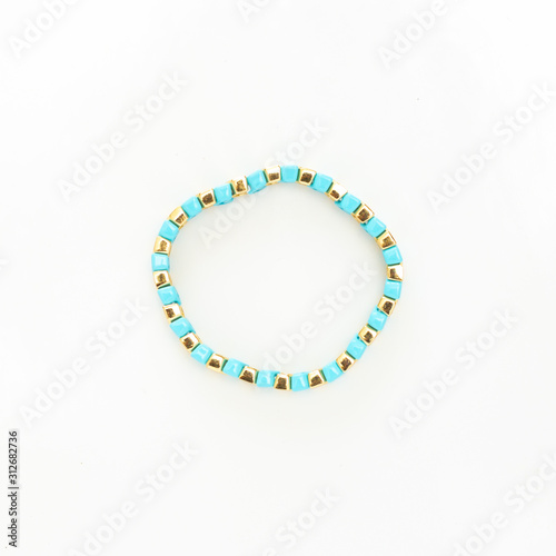 Gold and blue beaded bracelet