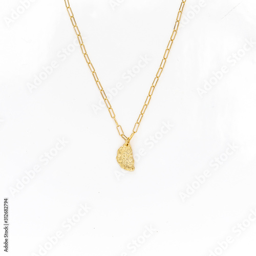 Gold Chain Necklace on White Isolated Background