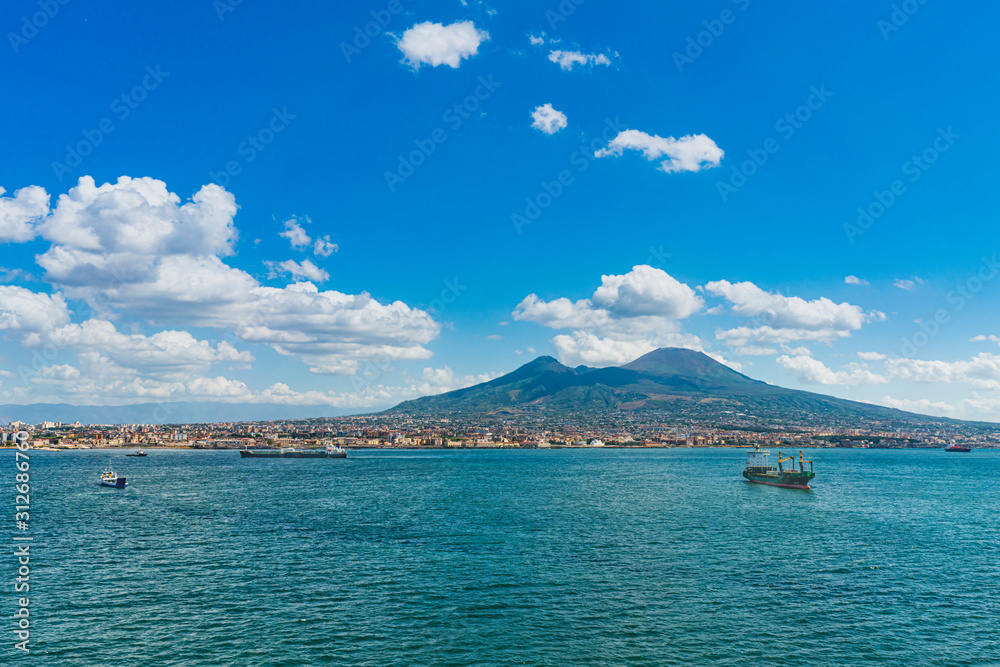 Naples and mount Vesuvius in the background, view from the sea Naples and mount Vesuvius in the background, view from the sea