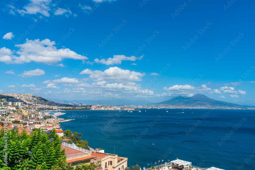 Naples city and port with Mount Vesuvius on the horizon