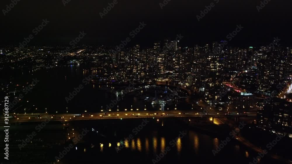 Bridge with the traffic and downtown in the night Bridge with the traffic and downtown in the night