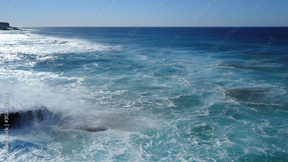 Fototapeta premium Relax with a break the waves