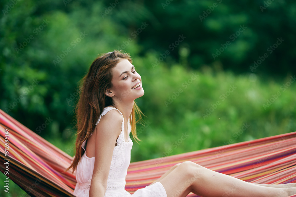 Fototapeta premium portrait of young woman in park