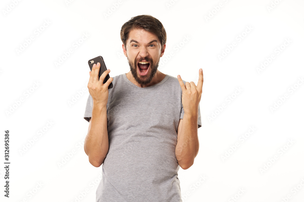 young man talking on cell phone isolated on white young man talking on cell phone isolated on white