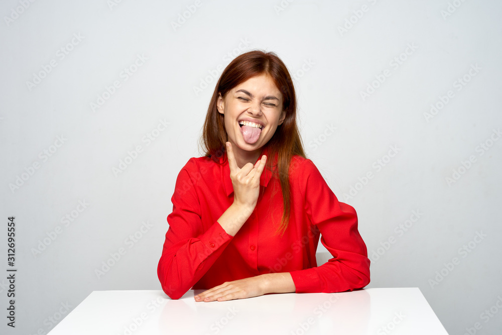 portrait of young woman sitting on sofa portrait of young woman sitting on sofa