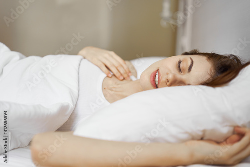 woman lying on her bed