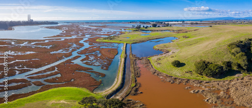 Aerial Panoramic View of Elkhorn Slough, Moss Landing, California. Elkhorn Slough is a 7-mile-long tidal slough and estuary on Monterey Bay in Monterey County, California.  photo