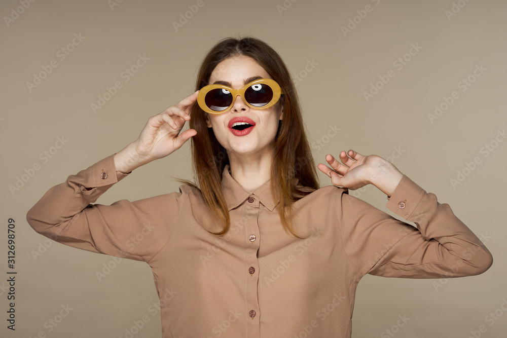 portrait of young woman in sunglasses portrait of young woman in sunglasses