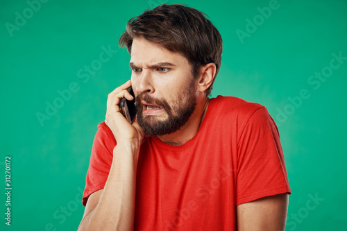 young man talking on the phone