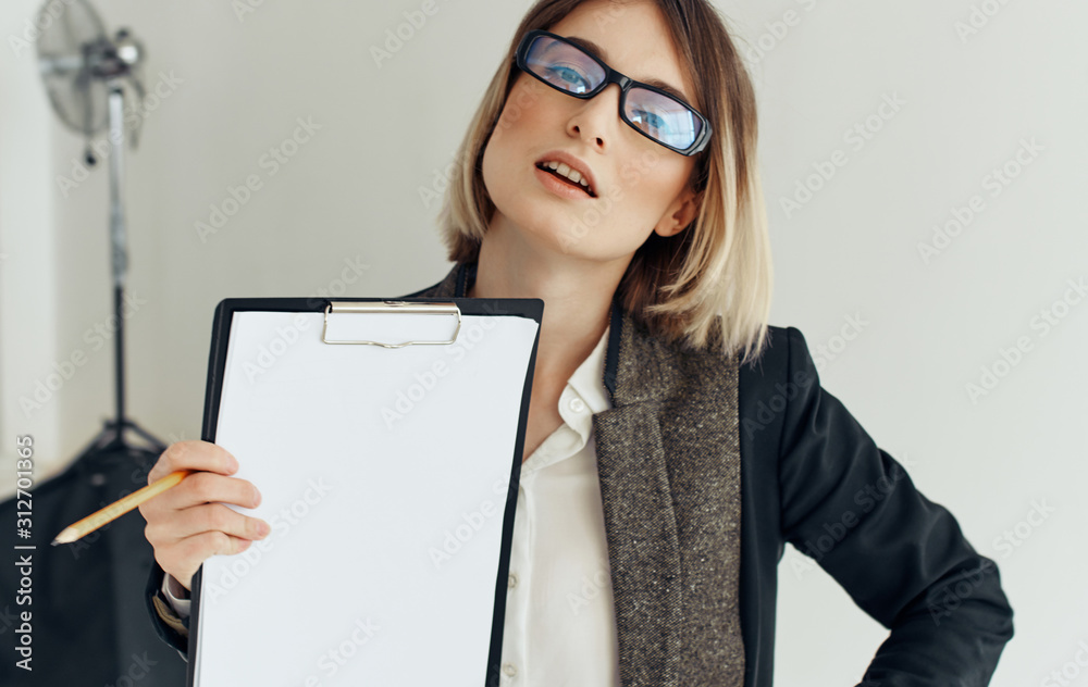 business woman holding clipboard business woman holding clipboard