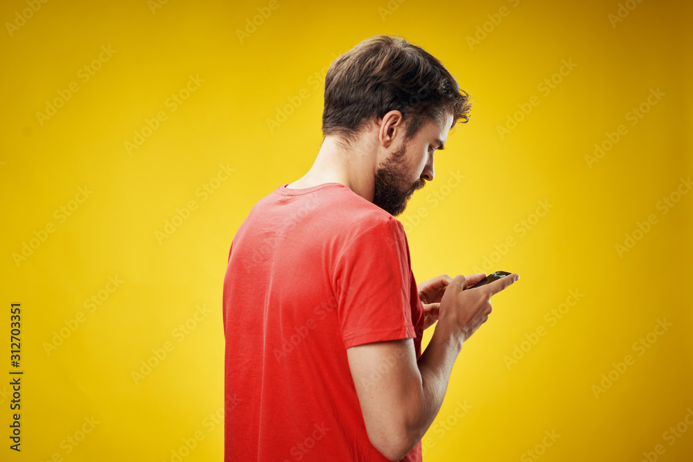 portrait of young man with mobile phone portrait of young man with mobile phone