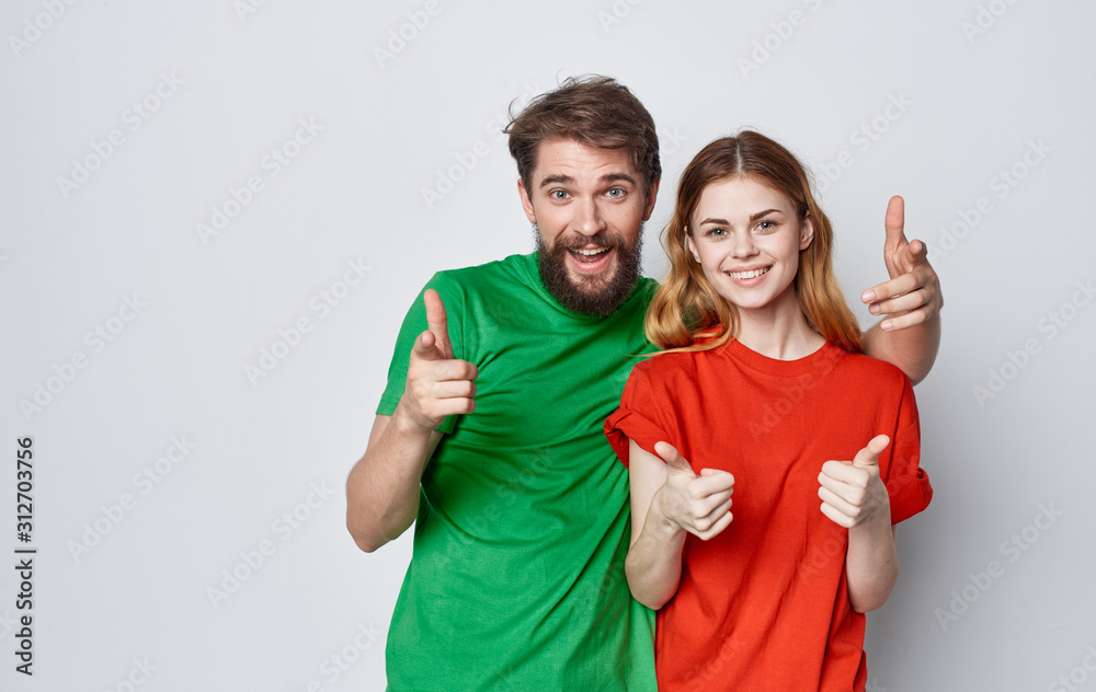 happy couple with thumbs up happy couple with thumbs up